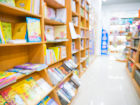 Blurred books on shelves in store