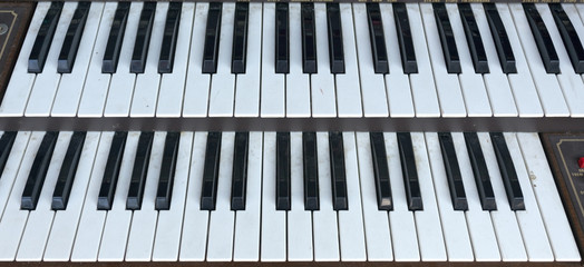Two tier musical instrument keyboard. Horizontal.