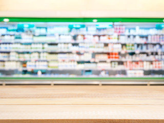 Empty table in front of blurred supermarket