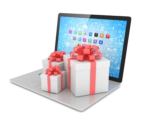 Gift box with ribbon bow on laptop keyboard. 3d rendering.