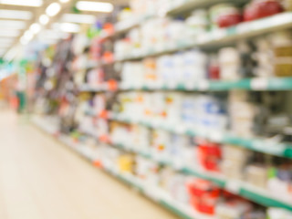Blurred colorful supermarket products on shelves
