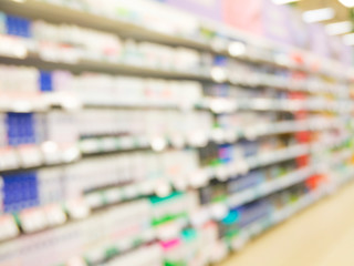 Blurred colorful supermarket products on shelves