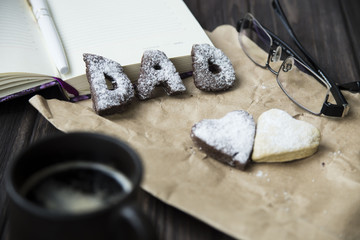 Happy Father's Day greetings - cookies and coffee on the desktop