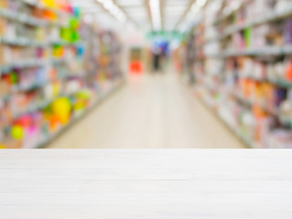 Blurred colorful supermarket products on shelves