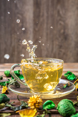 Green tea with spill drops