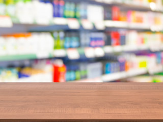 Naklejka na ściany i meble Blurred colorful supermarket products on shelves