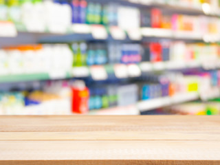 Blurred colorful supermarket products on shelves