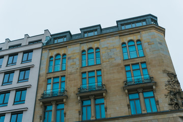 Fototapeta premium historical building next to typical office house