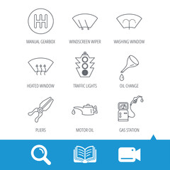 Motor oil change, traffic lights and pliers icons. Gas station, heated window and manual gearbox linear signs. Washing window icons. Video cam, book and magnifier search icons. Vector