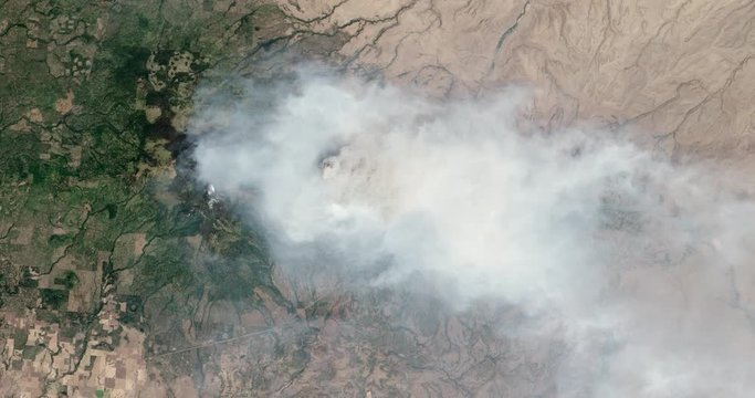 Aerial zoom out over the 2013 fires in the Simcoe Mountains, central Washington. Data: USGS/NASA Landsat.