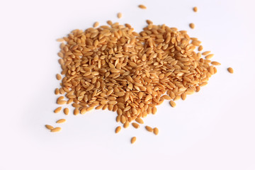 white flax seeds isolated on a white background