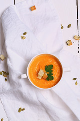 pumpkin soup with garlic croutons top view