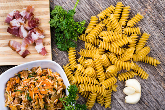 Rice, pasta, smoked ham in natural light