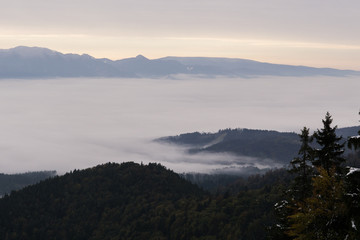 View from mountains with cloudy inversion below. Slovakia