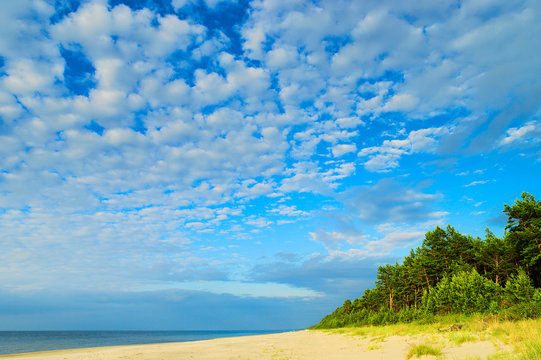 Cloudscape with stratocumulus  cloud formation over the beach at Baltic sea. Stegna, Pomerania, Poland.