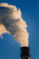 pipe smoke , harmful emissions into the atmosphere