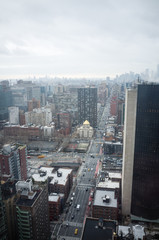 Midtown Manhattan cityscape from high floor on cloudy hazy day - 132265831
