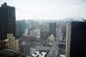 Midtown Manhattan cityscape from high floor on cloudy hazy day - 132265835