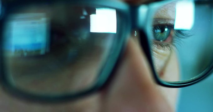 macro eyes web surfer and the office worker, insurance broker, workaholic, while working in the office evenings, control and security in the accesses, security, concept of internet web application.