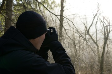 Photographer shooting the nature in winter. Slovakia