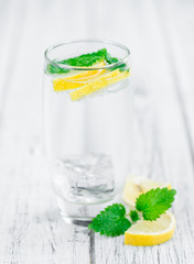 Wooden table with Lemonade (selective focus)