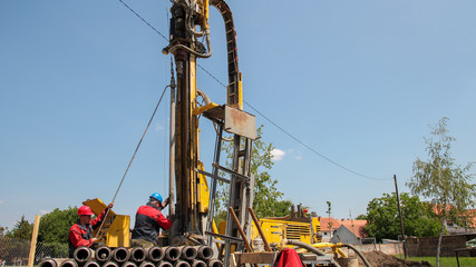 Workers on Drilling Rig