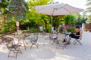 Tables and chairs of outdoor cafe © bubutu