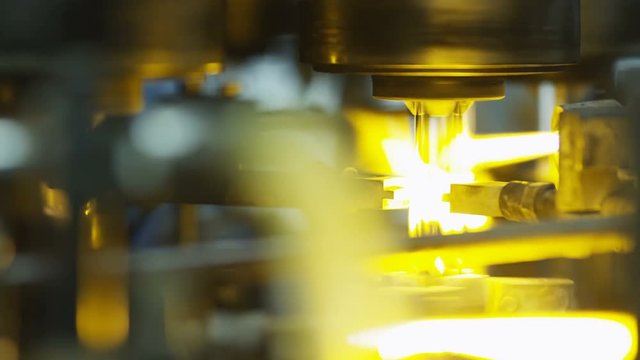 Firing glass with the flamethrowers at the glass-blowing plant