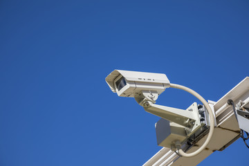 surveillance camera in the blue sky