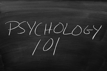 The words "Psychology 101" on a blackboard in chalk