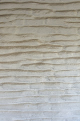 White and worn wall texture made of adobe bricks