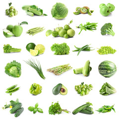 Assortment of fresh vegetables and fruits on white background