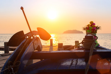 Naklejka premium Sunset above the sea in the Asian fishing village.