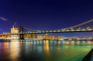 Panorama of Manhattan Bridge in New York City at night