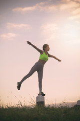 Silhouette fitness woman exercising at sunset time, Vintage Effect