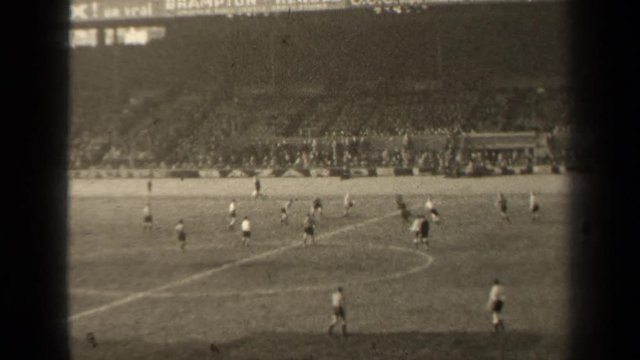 1947: a black and white video of a professional soccer game. PARIS FRANCE