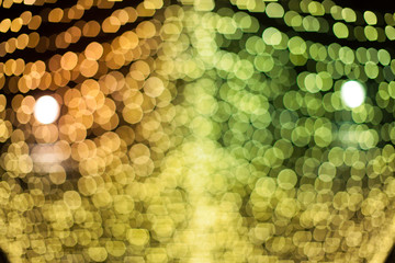 abstract background of colorful bokeh of lamp in party with tech
