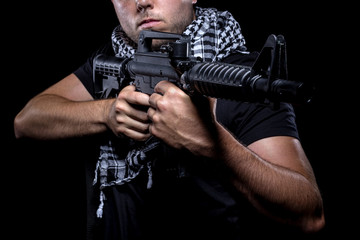 Soldier representing private military company mercenary industry of gun for hire.  These commandoes...