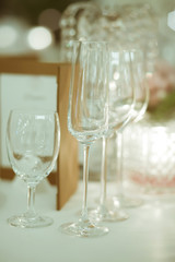 wine glass setup on the table in luxury dinner party, Blurry bac