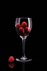 Strawberries in a glass of wine