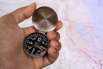 hand man catch the compass