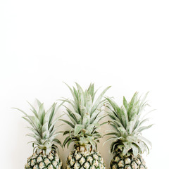 Three pineapples. Flat lay, top view