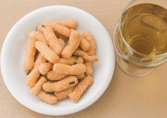 Crispy sweet fried dough with hot tea..