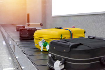 Suitcase or luggage with conveyor belt in the airport