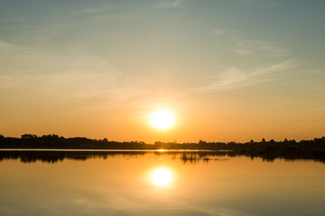 Naklejka na ściany i meble sunset on the lake landscape