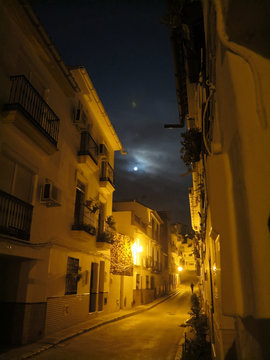 Full moon over Alora Street