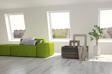 White room with green sofa. Scandinavian interior design