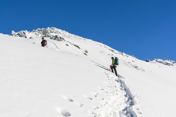Fototapeta na wymiar Winter mountaineering.