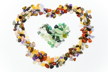 Colorful stones in heart shape isolated