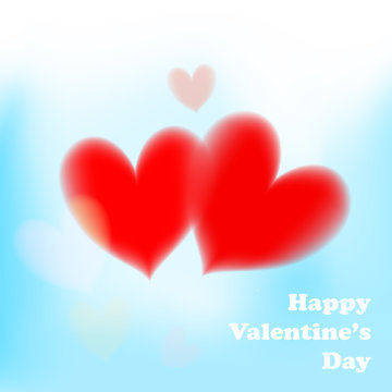 Valentines day card with soft red hearts on blue background